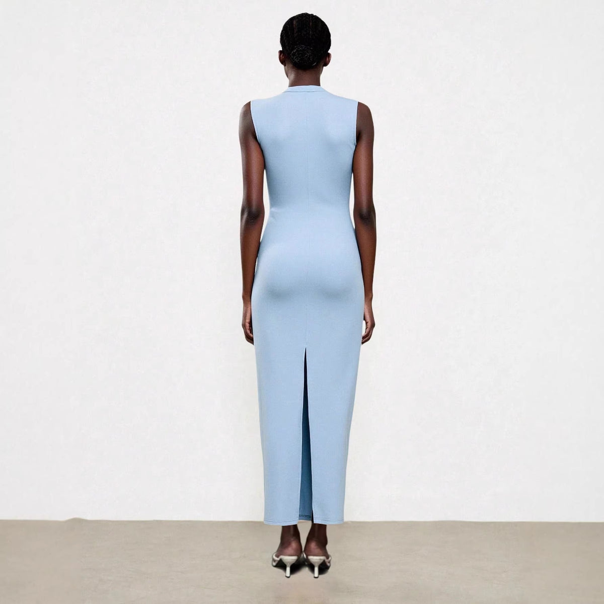 Elegant Sleeveless Slit Dress With A Sophisticated Vibe