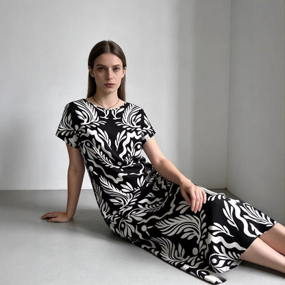 Elegant Loose-fitting Long Dress With A Round Neck And Short Sleeves